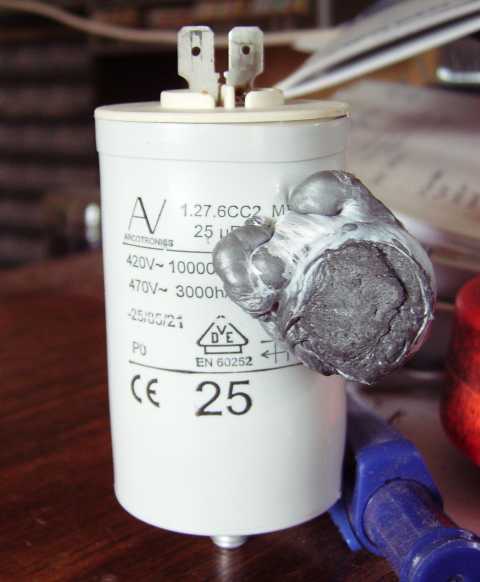 The capacitor with the electrolite boiled out the side.
