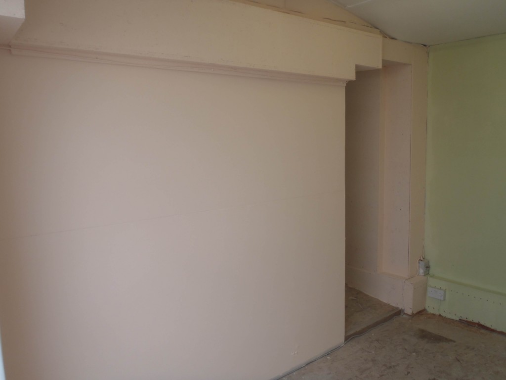 Living room area painted in pink