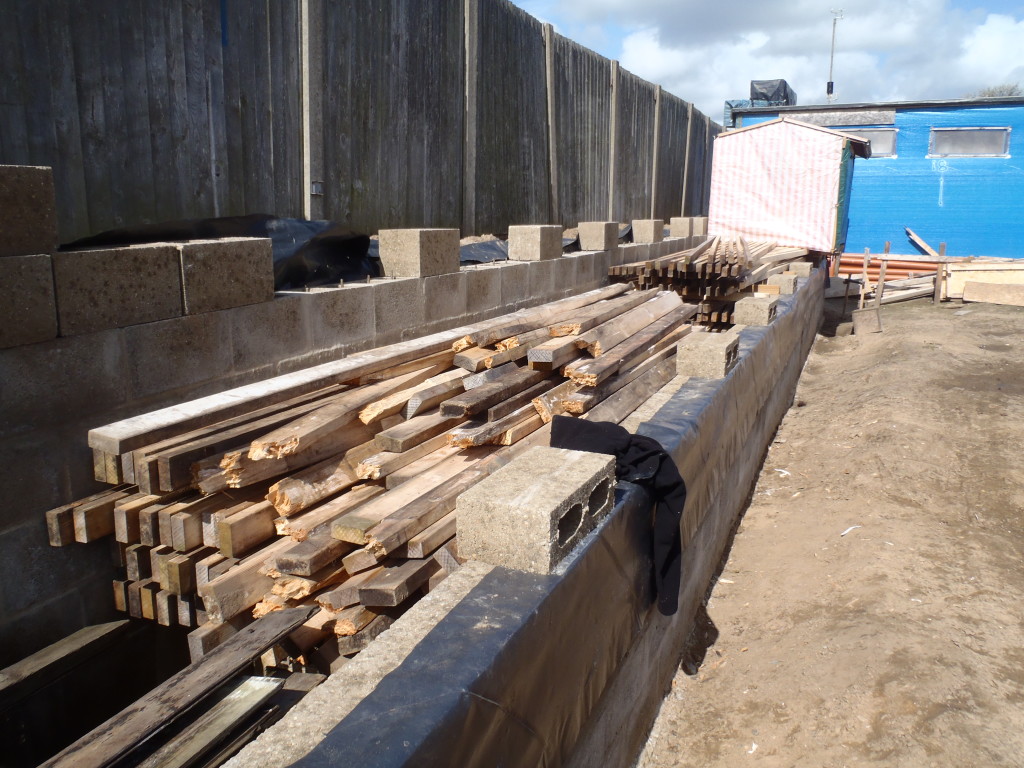 Timber-stacked-on-lane-1