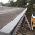 Overhanging Roof Panel and Felt Repair