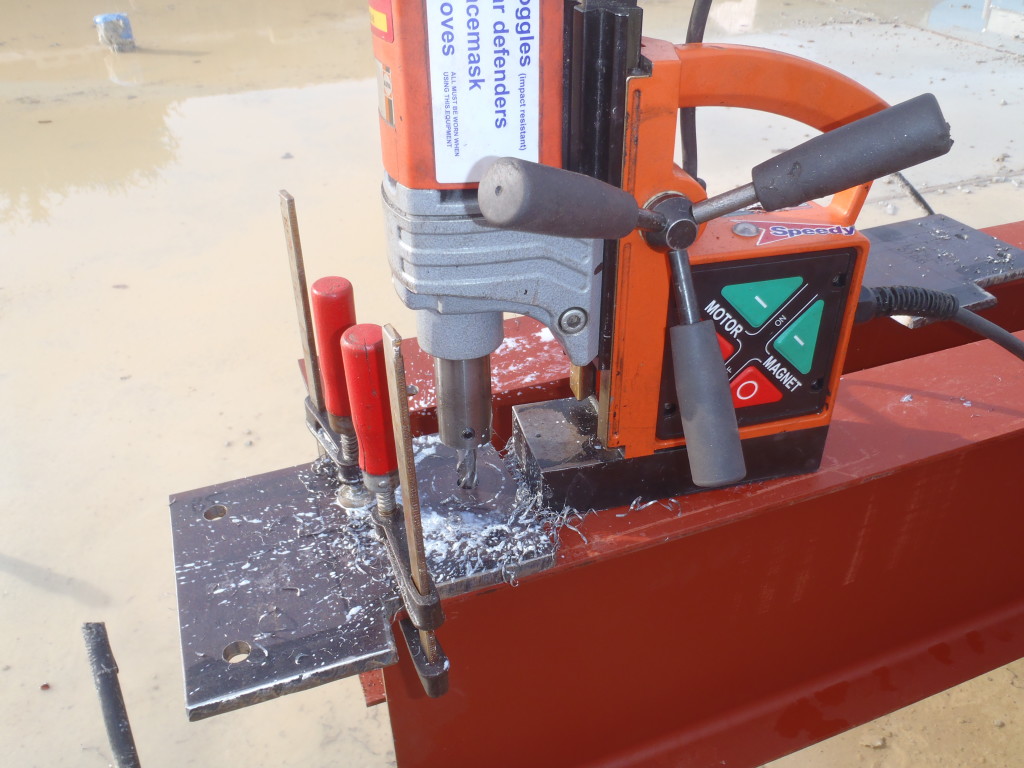 Drilling-both-the-top-plate-of-the-leg-and-the-beam