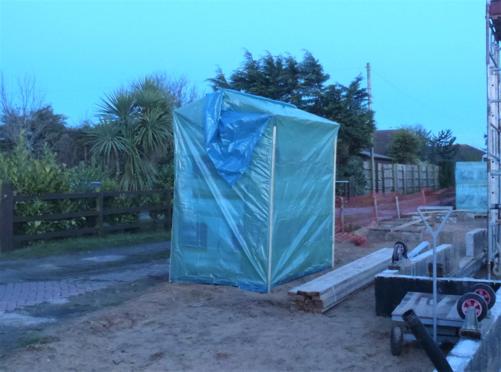 Pallet-of-Ply-with-Frame-and-Tarpaulin