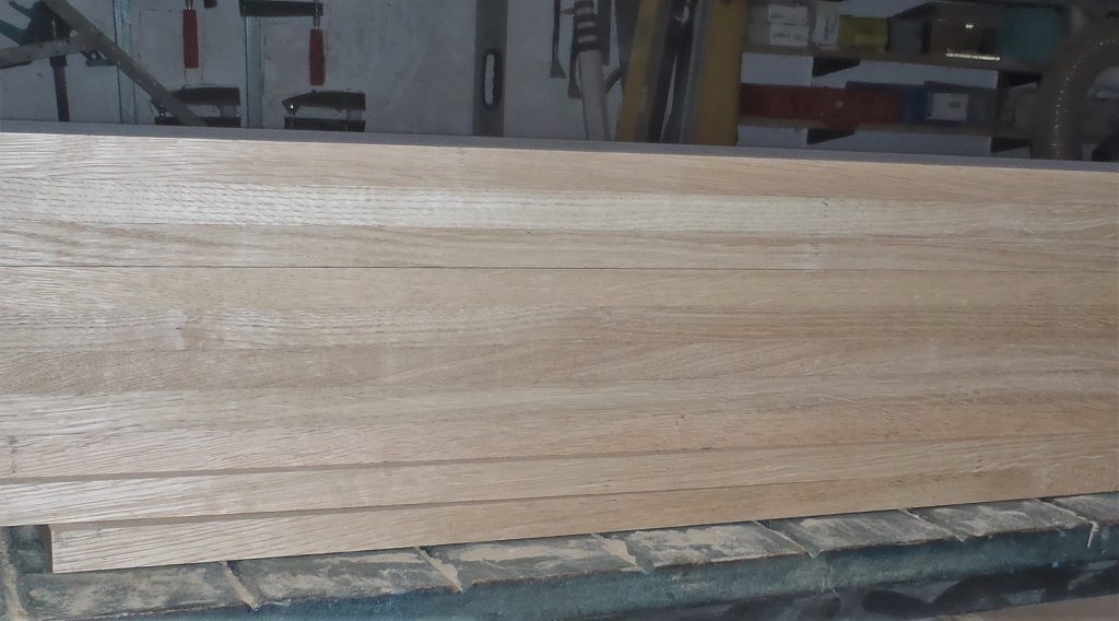 Newest-pile-of-planed-20mm-Oak-1