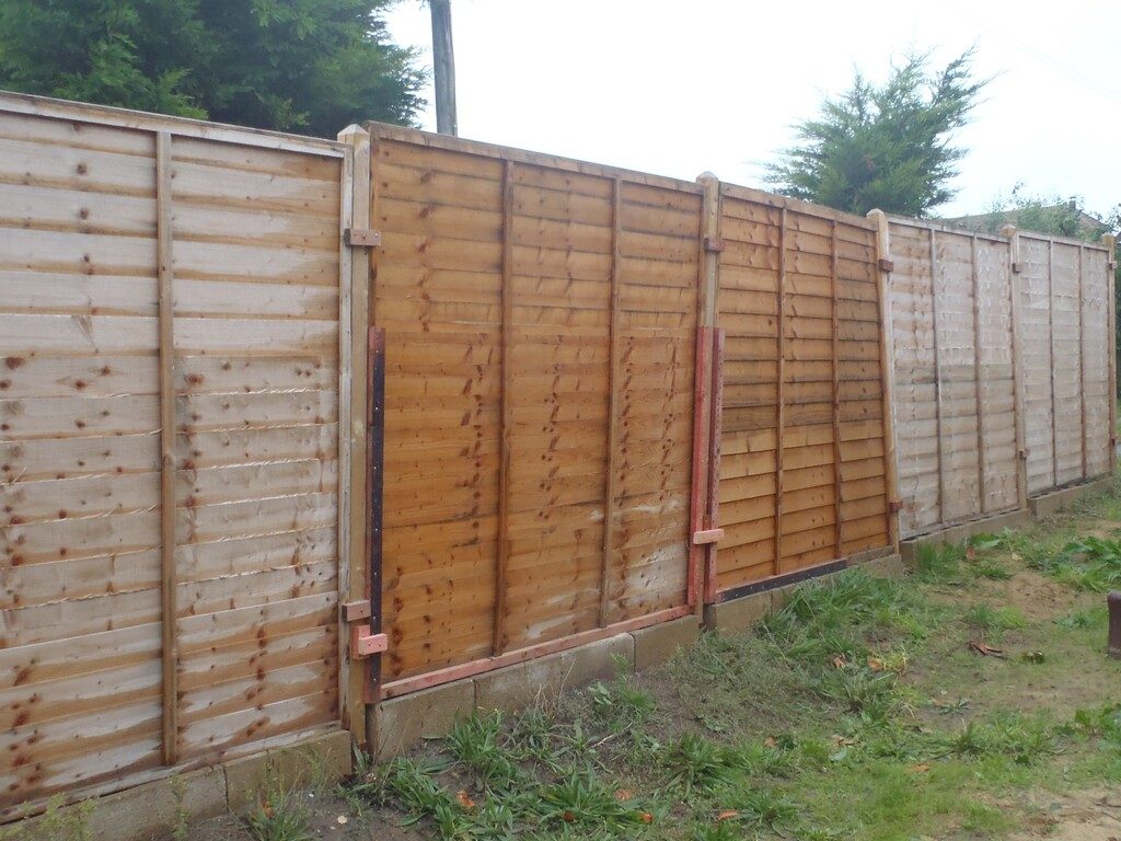 Sun Shield Over Corridor Removed and Two Fence Panels repaired After Storm