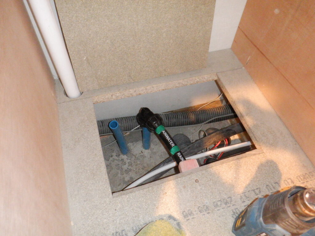 Rainwater pipe starts under utility floor